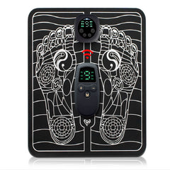 Black EMS foot massager mat with digital remote controllers and foot reflexology design