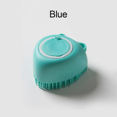 Blue soft silicone dog brush with ergonomic handle for gentle pet grooming