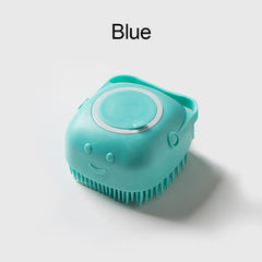 Blue soft silicone dog brush with ergonomic handle and gentle bristles for pet grooming
