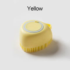 Yellow soft silicone dog brush with flexible bristles designed for gentle pet grooming