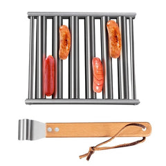 Stainless steel hot dog roller with four hot dogs and a wooden handle grilling tool